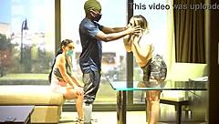 masked whores slobber on two cocks from distance