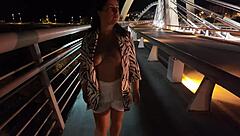 luscious milf struts braless pantyless on bridge flashing huge natural tits