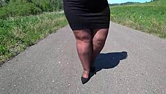 Hey, watch this mature bbw strut in pantyhose heels on public road?
