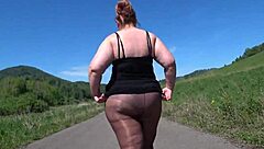 Hey, watch this mature bbw strut in pantyhose heels on public road?