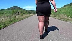 Hey, watch this mature bbw strut in pantyhose heels on public road?