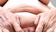 horny granny spreads shaved wet pussy wide for intense solo orgasm