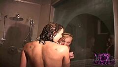 Real natural tits and shaved pussy glistening wet in steamy shower