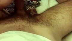Skinny brazilian guy masturbates huge cock lying down