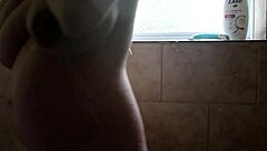 pregnant babe's sudsy shower leads to smooth shaved tease