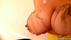 lucy rose drips candle wax on her curves