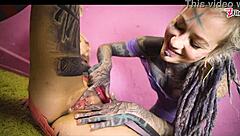 Tattooed goth lesbians rip clothes for strap-on orgasms