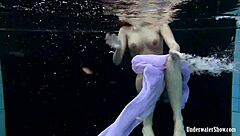 blackhaired aneta dives into seductive pool nudist vibes