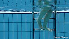 blackhaired aneta dives into seductive pool nudist vibes