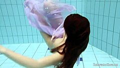 blackhaired aneta dives into seductive pool nudist vibes