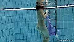 blackhaired aneta dives into seductive pool nudist vibes