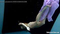 blackhaired aneta dives into seductive pool nudist vibes