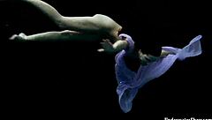 blackhaired aneta dives into seductive pool nudist vibes