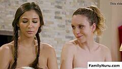 Oiled girls kissing and licking wet pussies in erotic massage threesome