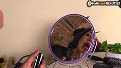 barefoot brunette ballerina shoves long legs in your face