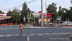 Strutting completely nude on crowded city streets