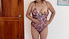 blonde mature masturbates in bikini on beach