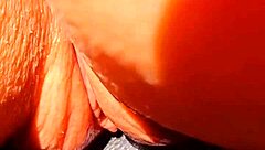 mature blonde casually shows her huge wet pussy