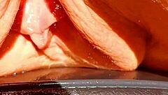 mature blonde casually shows her huge wet pussy