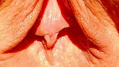 mature blonde casually shows her huge wet pussy