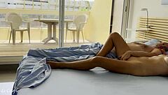 Wife watches nudists as husband wakes