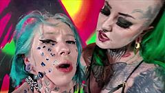 Submissive emo begs tattooed mistress for lesbian strapon fuck