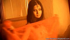 Exotic beauty dancer strips nude teasing sensually