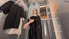 Naked Brunette Flashes Shaved Pussy in Public Changing Room