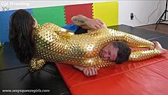 Bella's Golden Squeeze Headscissor Dominates Mixed Wrestling Match