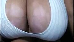 Ebony webcam babe bounces massive black tits seductively