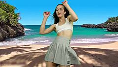 hey she's dancing on beach flashing big pussy lips without panties!