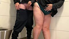 curvy woman strokes stranger to cum explosion in public toilet?