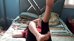 bold sexy latina strips reveals cute feet