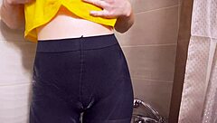 voyeur milf teases wet pantyhose pussy in shower