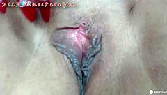 A Depraved Purple-Haired Mature Bitch Masturbates Her Big Tits Wildly!