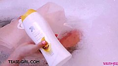 gorgeous brunette bathes seductively in steamy solo scene