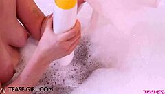 gorgeous brunette bathes seductively in steamy solo scene