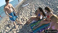 Girls flash bikinis on beach convinced for painted body cash in public outdoor tease