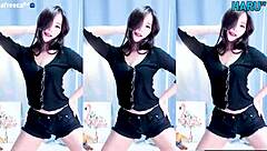 cute korean dancer sways seductively