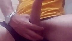 Guy Stroking Cock Cums Hard in Bathroom!