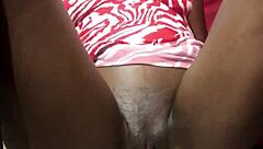 red and white mini dress flatters her curves perfectly