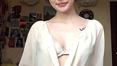 Smooth pussy revealed after stripping off her underwear on cam