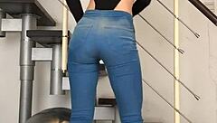 chinese girl dances seductively in tight jeans