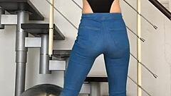 chinese girl dances seductively in tight jeans