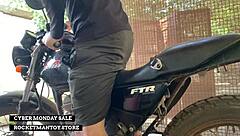 Man straps rocketman sex toy to motorbike for shaking orgasm in public shop