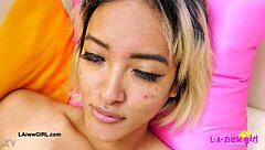 gorgeous asian model poses her petite body seductively during photoshoot interview