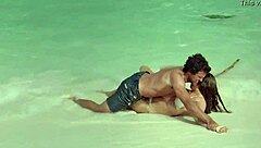 Kelly Brook bares huge boobs nude beach scenes in Survival Island movie