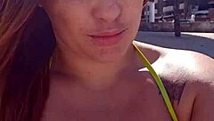 african exhibitionist flashes body drawing stares from guys on the beach