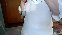 Milf tidies house in see-through dress no panties