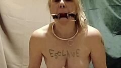 Bound slave masturbates with clips outdoor